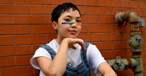 young woman showing pride